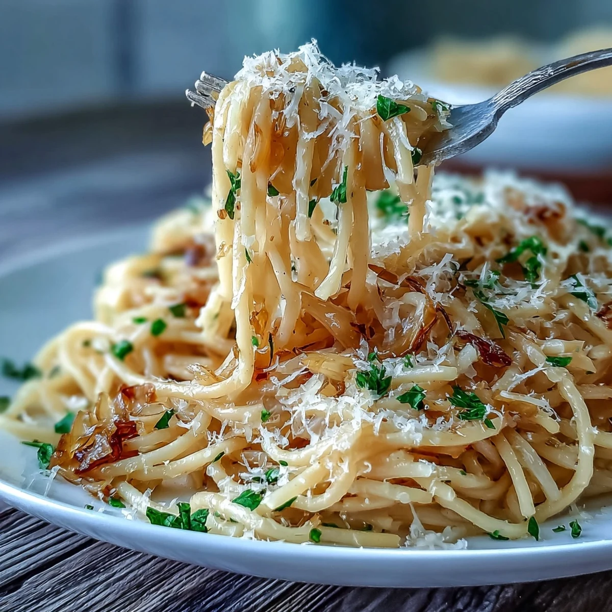 Cabbage Pasta With Garlic and Parmesan plated, with golden caramelized cabbage and al dente spaghetti tossed in a buttery skillet.
