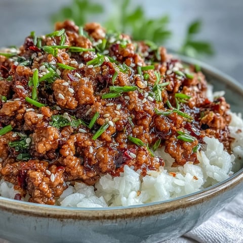 Freshly cooked Korean-Style Ground Turkey in a glossy, spicy-sweet sauce with sautéed garlic and ginger.