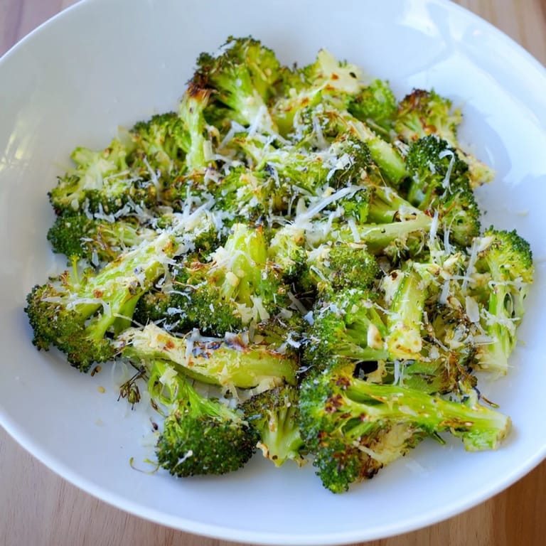 Crispy-edged Simple Garlic and Parmesan Roasted Broccoli, perfect as a flavorful side beside your entree.