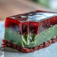 A beautiful layered yokan dessert with smooth red bean jelly and fragrant matcha green tea jelly.